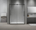 Modern bathroom with a glass shower enclosure, sink, and decorative elements.