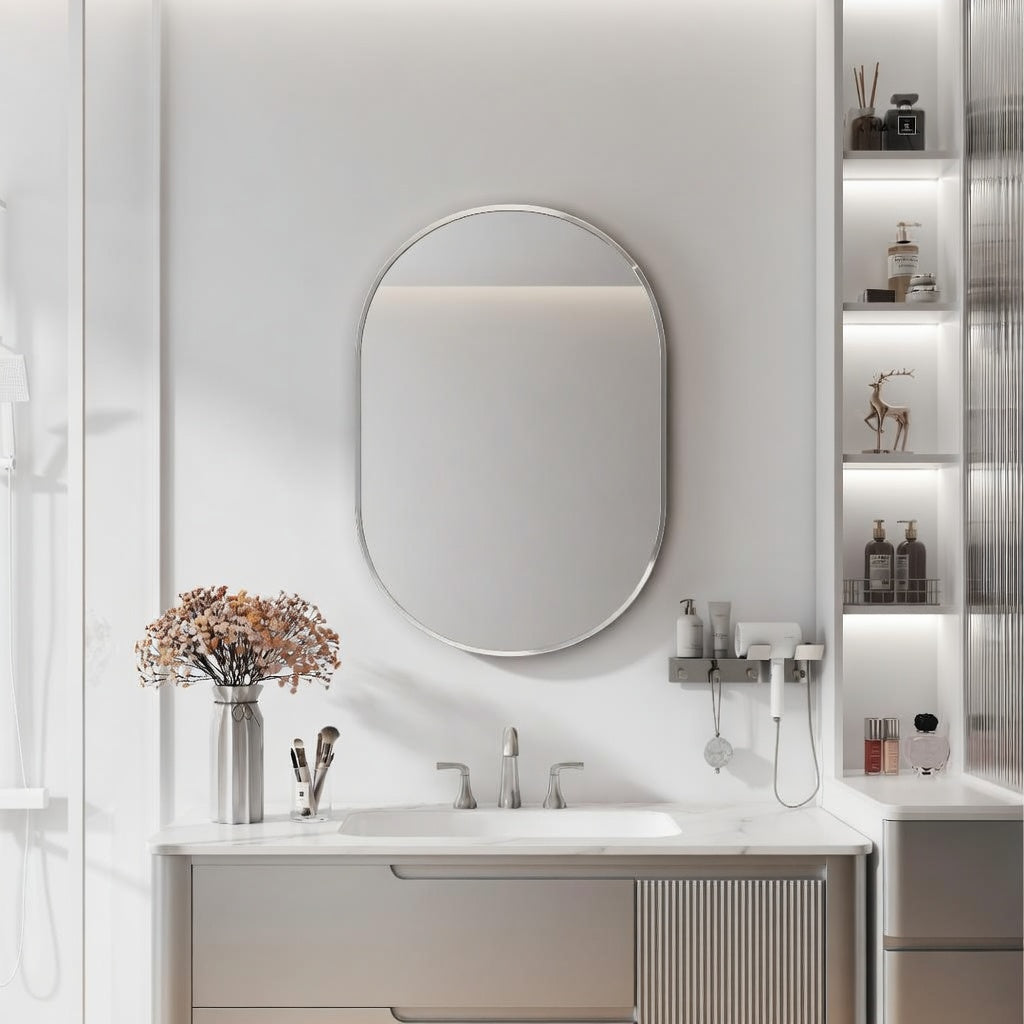 Modern bathroom with a sink, mirror, and decorative elements.