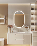 Modern bathroom vanity with illuminated mirror and decorative elements.