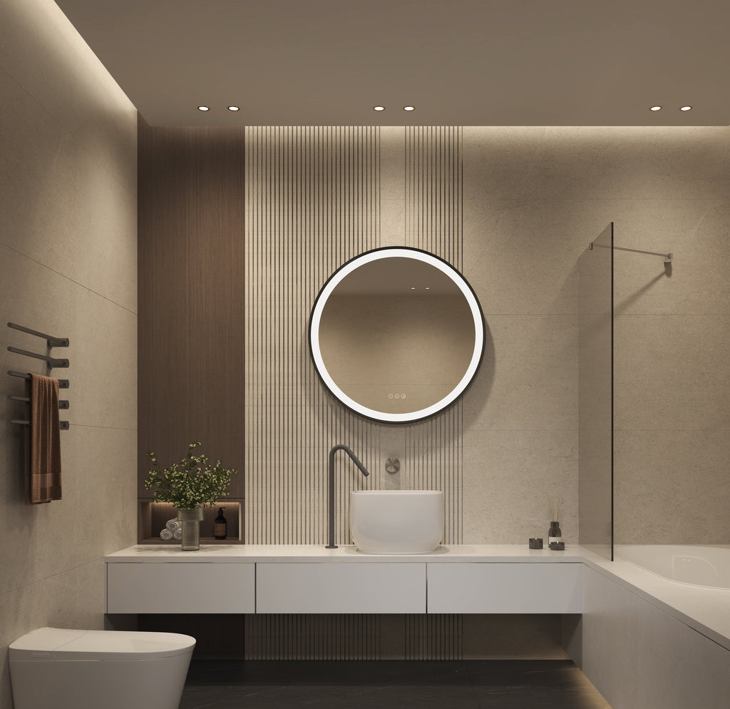 Modern bathroom with round illuminated mirror, sink, and shower.