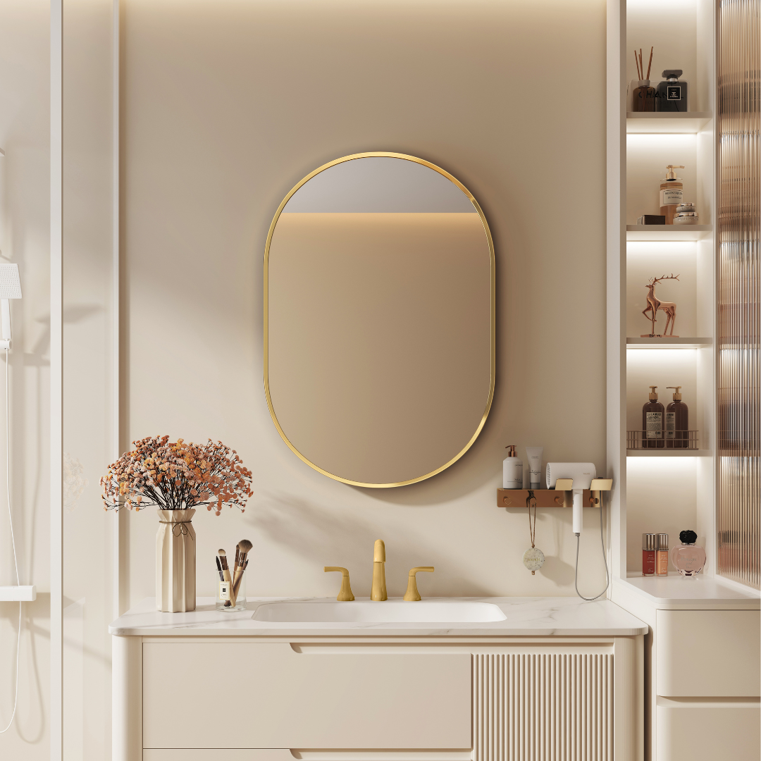 Modern bathroom vanity with gold-framed mirror and decorative elements.