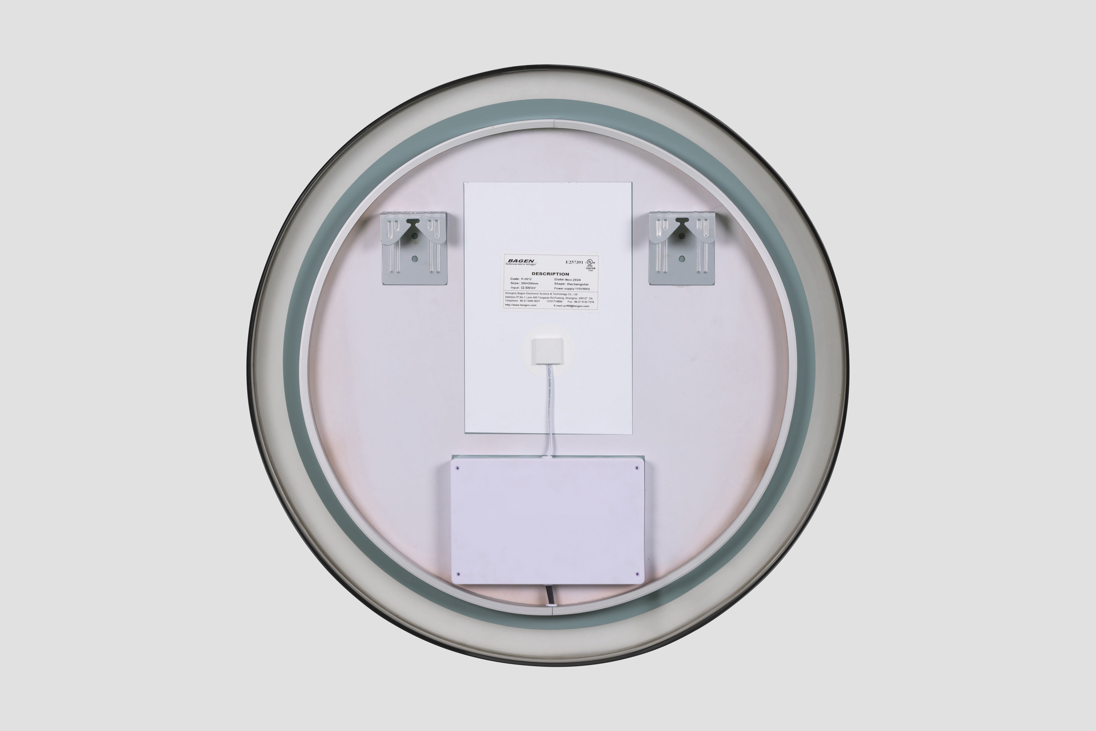 Round wall clock with a white face and black hands on a light gray background