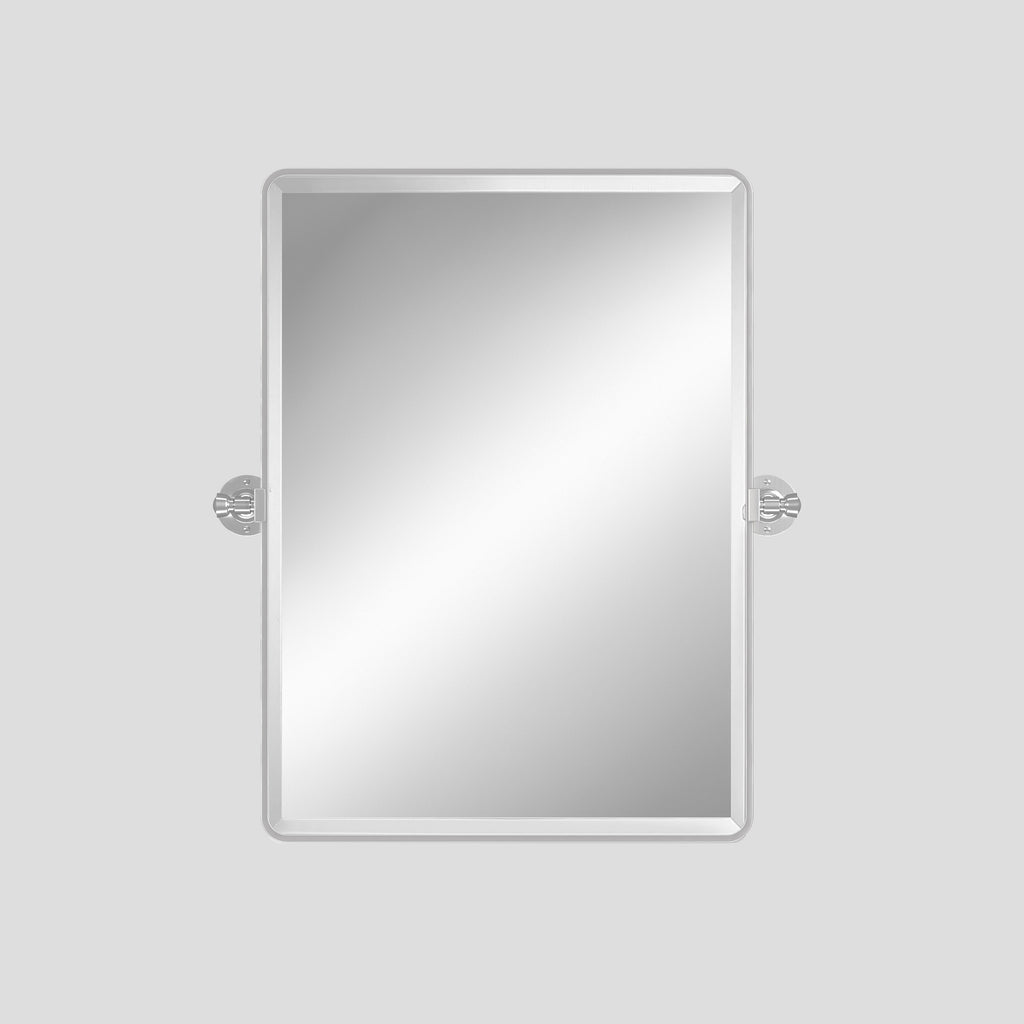 Rectangular mirror with decorative brackets on a light gray background