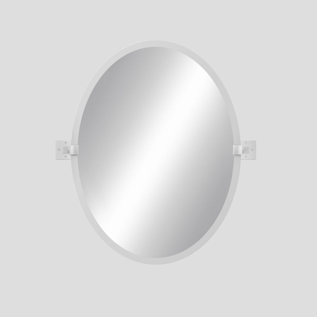 Round mirror on a white wall