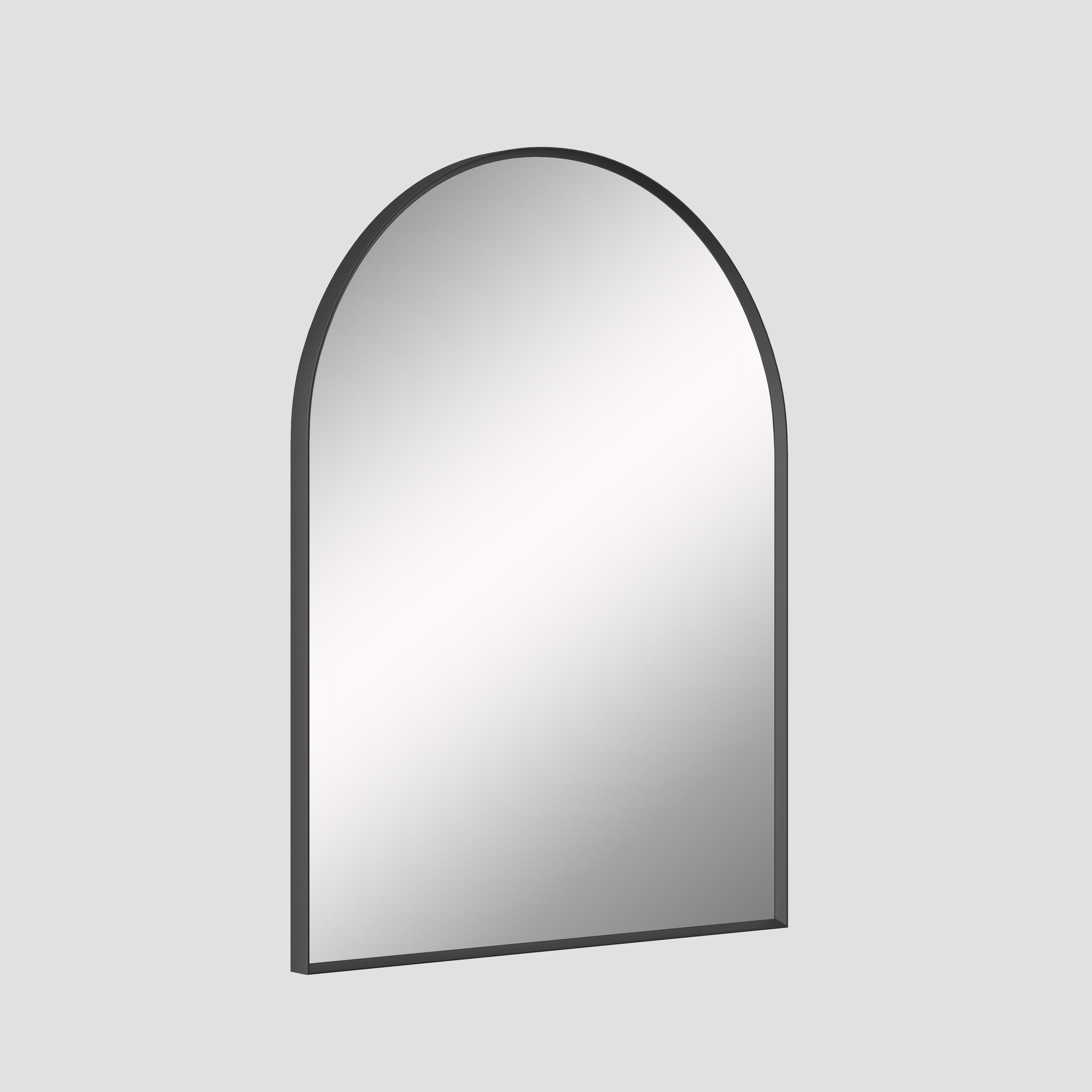 Arched mirror with black frame on a light gray background