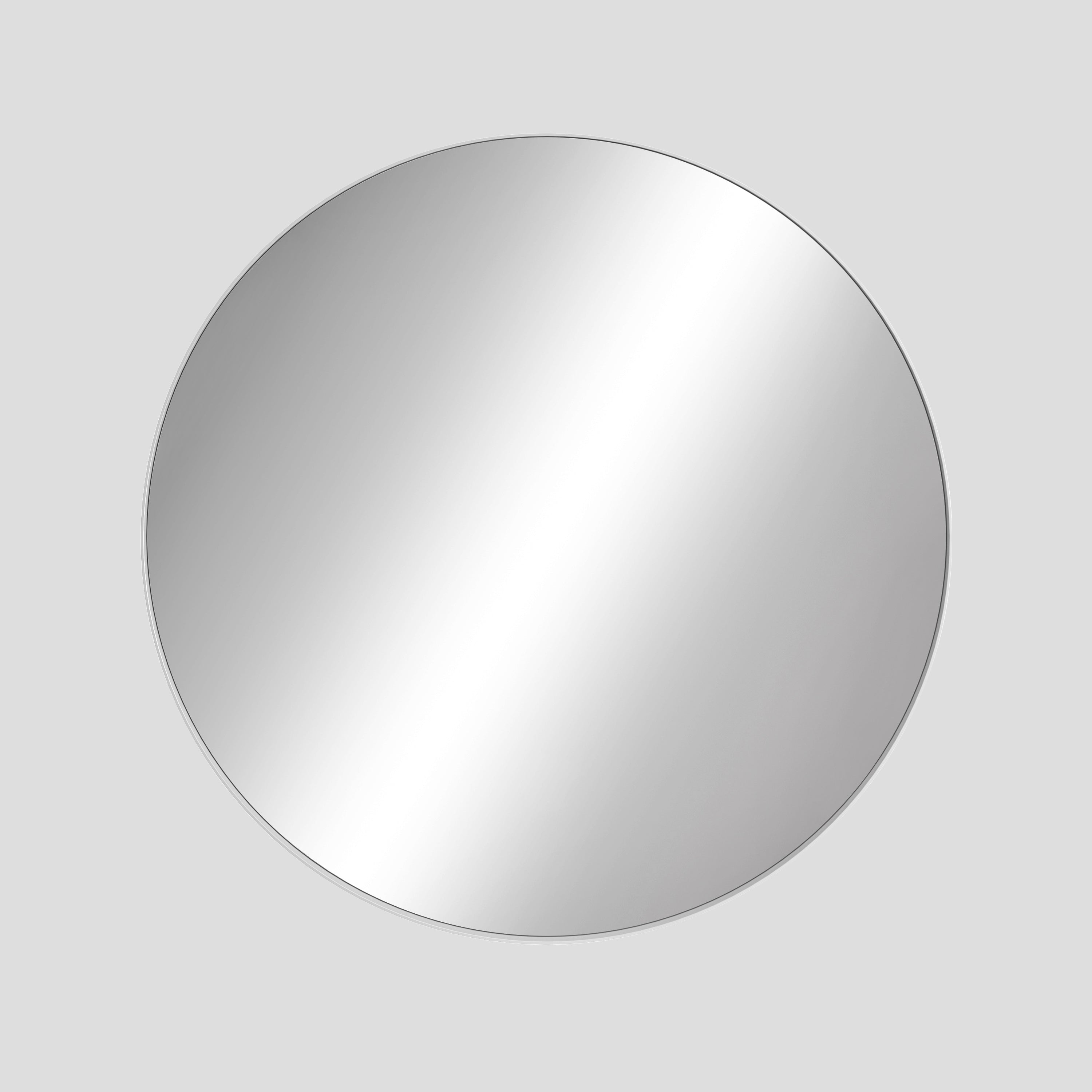 Round silver mirror on a light gray background