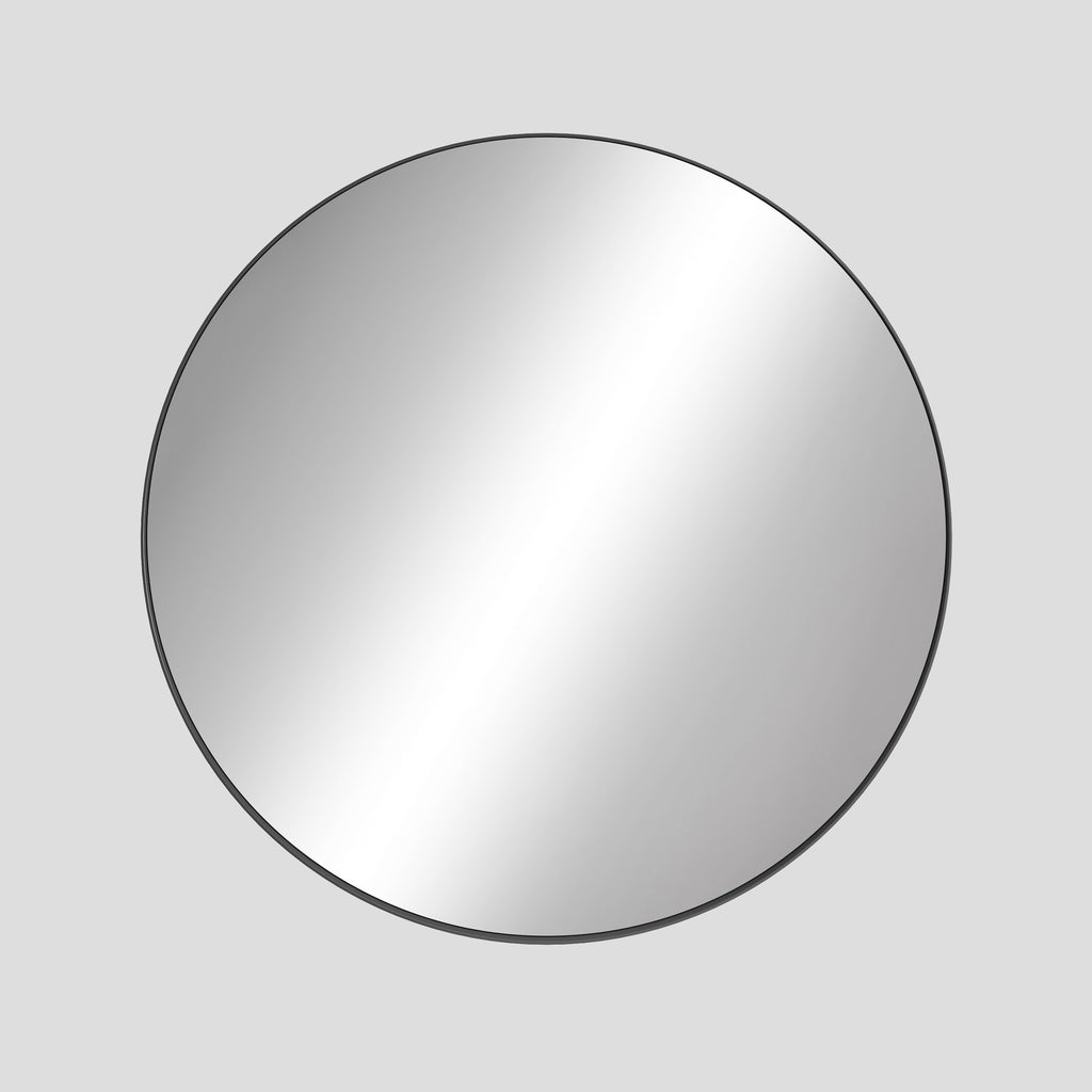 Round mirror with a black frame on a light gray background