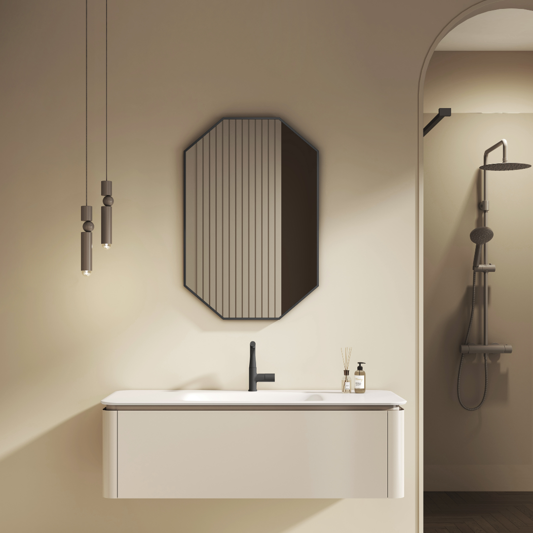 Modern bathroom with a sink, mirror, and shower area.