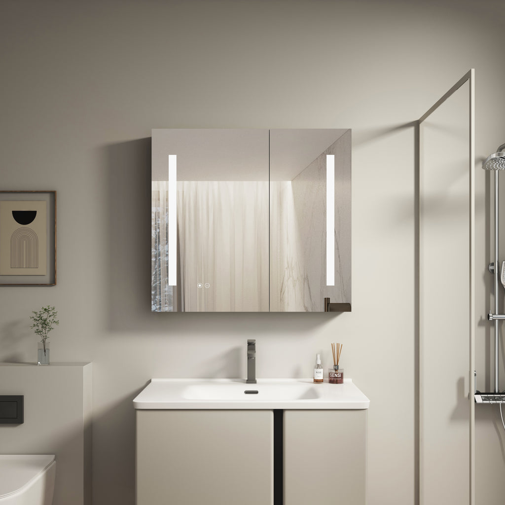 Modern bathroom with a vanity, sink, and illuminated mirror.